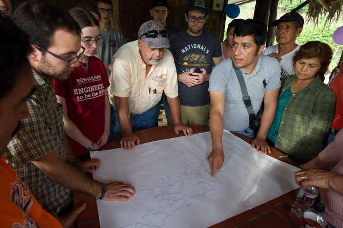 Discussing the locations of homes with community members